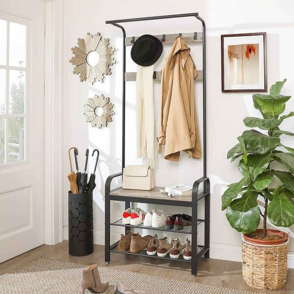 Modern industrial-style hallway unit in black and greige, featuring a sturdy clothes rail and open shelving for storage.
