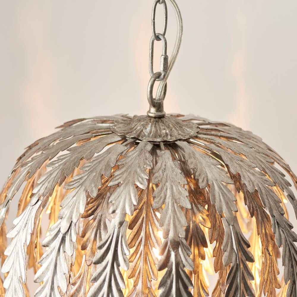 Luxurious silver leaf-finished pendant light, blending classic elegance with artistic craftsmanship.
