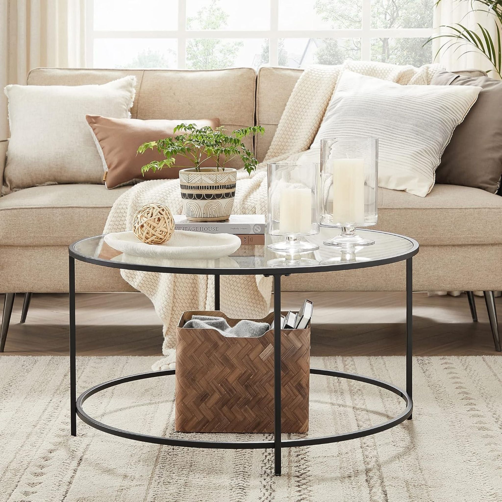 Stylish round black glass coffee table, perfect for modern living spaces and contemporary interiors.

