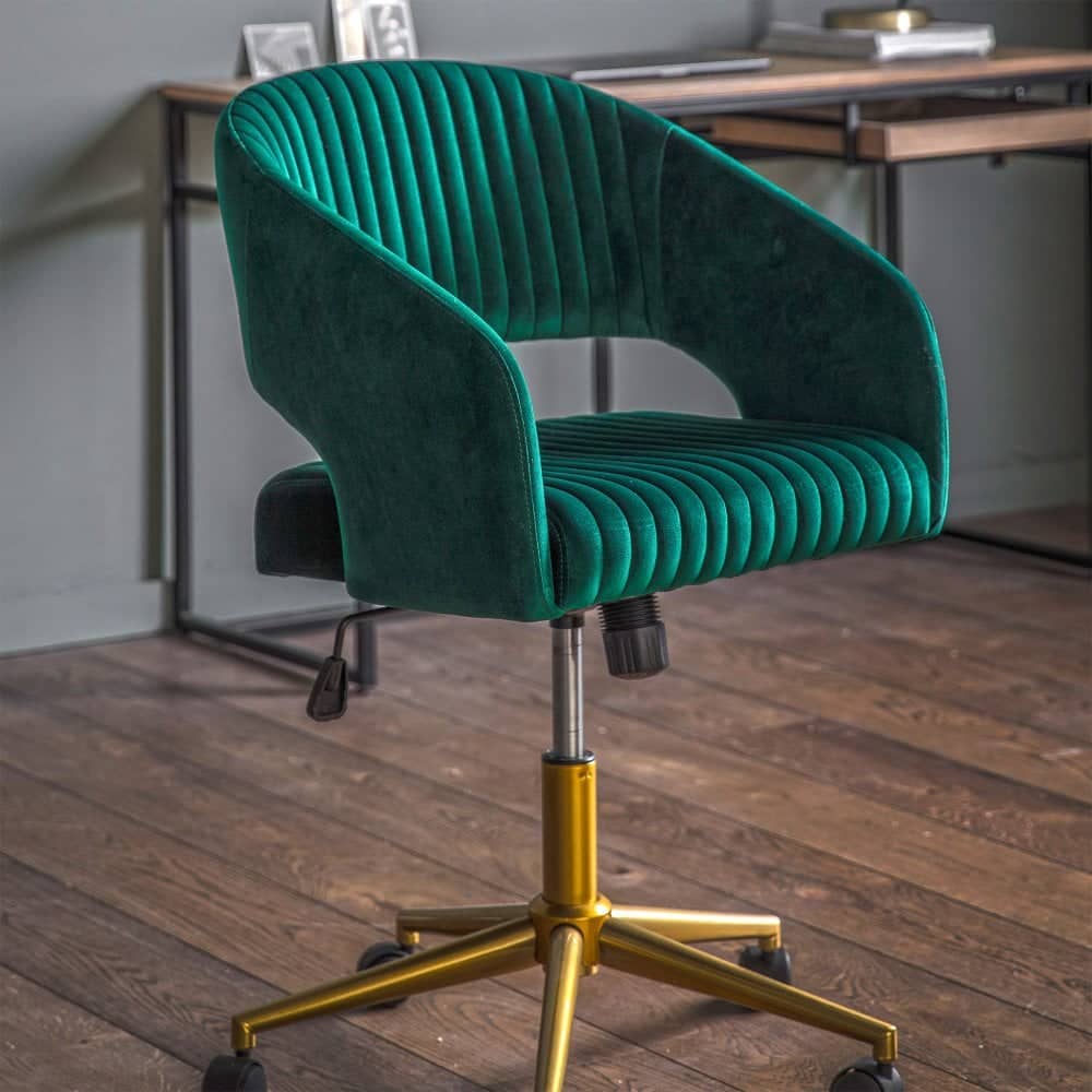 Elevate your home office with this luxurious green velvet swivel chair, designed for both comfort and style with an adjustable seat height and a sturdy golden base.
