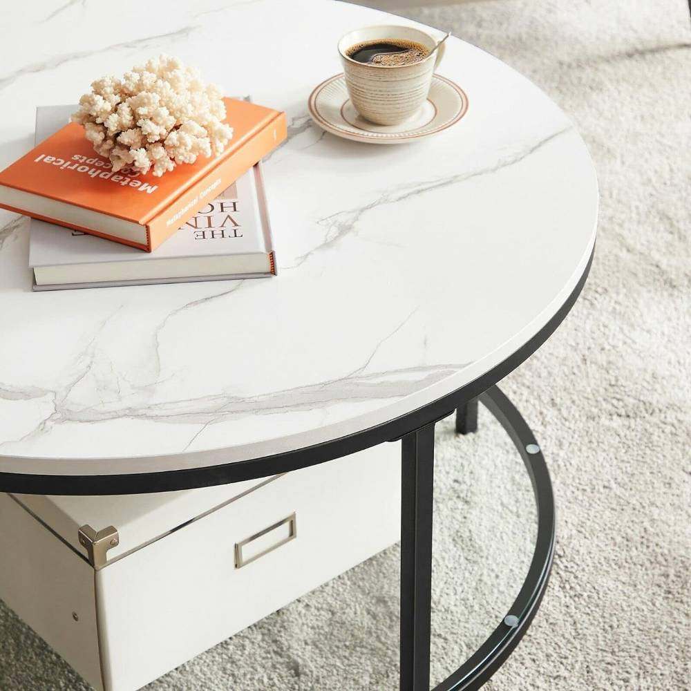 Round coffee table with a white marble effect finish, designed to add a chic and elegant touch to living rooms, lounges, or waiting areas.
