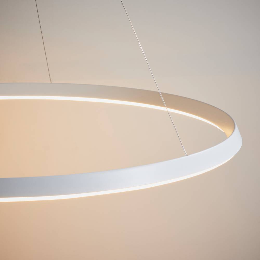 Minimalist white circular pendant light with a refined design, crafted from premium aluminium, alloy, and acrylic, adding a sophisticated and modern touch to your space. Adjustable for the perfect fit.
